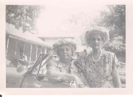 2 women by car